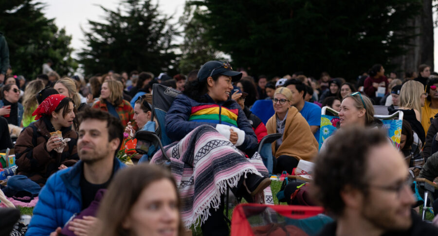 Attendees packed in and snuggled up at Alamo Square Park on June 8, 2023 for the Sundown Cinema screening of the 1978 film, “Invasion of the Body Snatchers”. (Michaela Mateo/Golden Gate Xpress)