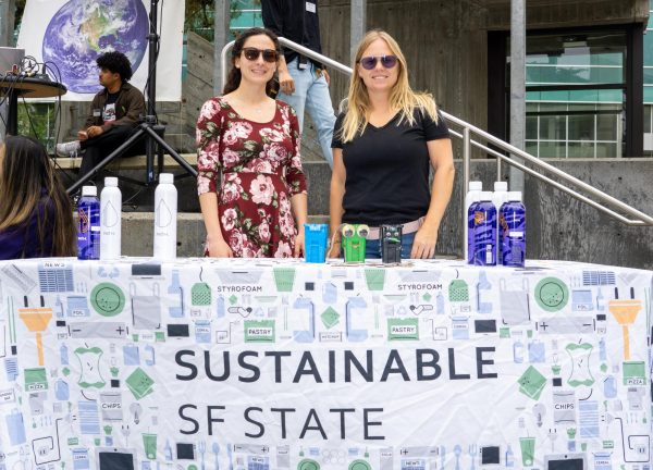  Caitlin Steele, the director of sustainability & energy at the Office of Sustainability, and Taylor Mogavero, the climate action coordinator, pose for a photograph during the Open House event held at Malcolm X Plaza on Sept. 26, 2023. (Ryosuke Kojima/ Golden Gate Xpress)
