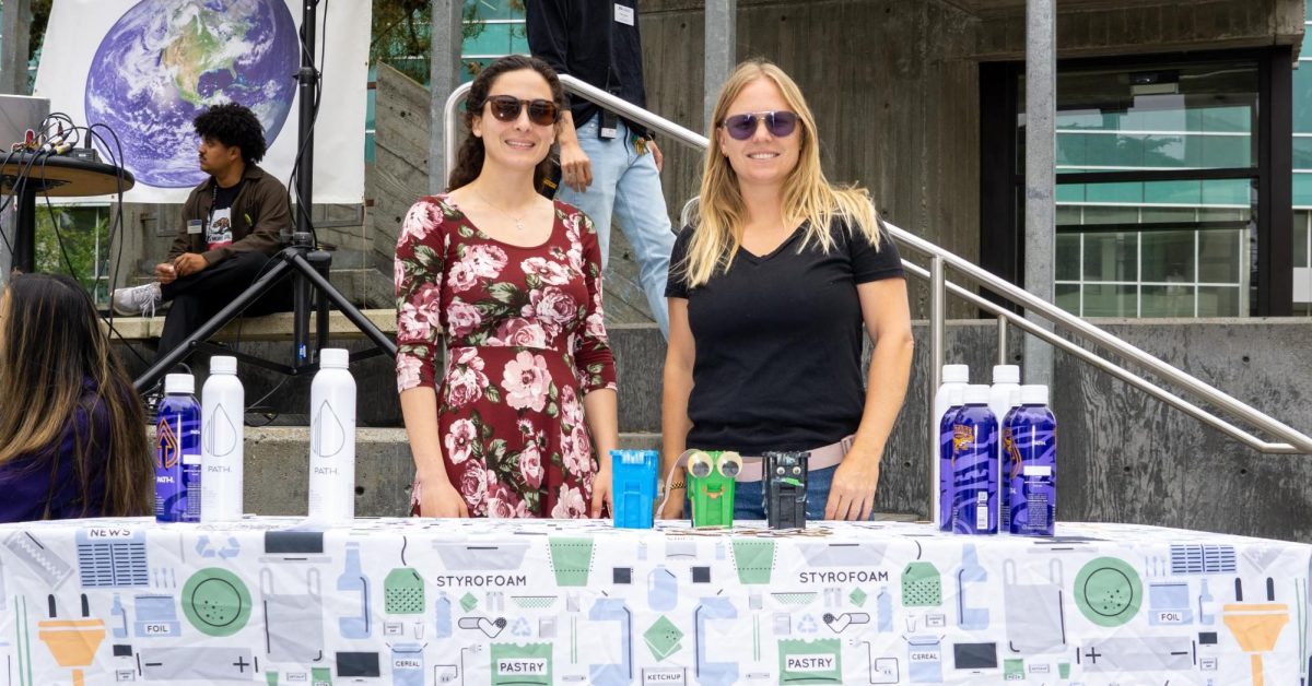  Caitlin Steele, the director of sustainability & energy at the Office of Sustainability, and Taylor Mogavero, the climate action coordinator, pose for a photograph during the Open House event held at Malcolm X Plaza on Sept. 26, 2023. (Ryosuke Kojima/ Golden Gate Xpress)
