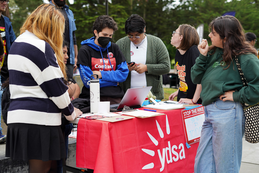 YDSA members table on Wednesday, Sept 13, 2023 while watching the CSU Board Meeting at Malcolm X Plaza. (Michaela Mateo / Golden Gate Xpress)
