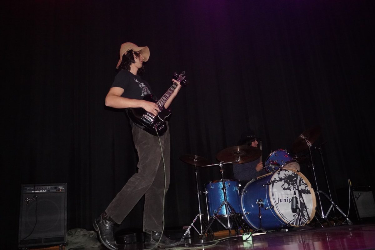 Elijah Reynolds plays the guitar alongside other members of the band in the opening show before DJ Mandy on Oct. 26, 2023. (Feven Mamo/ Golden Gate Xpress) 