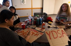 The League of Filipino Students and Haüs BlàQue hosted together a “No2Apec” prop build forum on Nov. 6, 2023, where they educated students on the issues of the Asia-Pacific Economic Cooperation and made signs to picket in the upcoming series of rallies in San Francisco. (Michaela Mateo / Golden Gate Xpress) 
