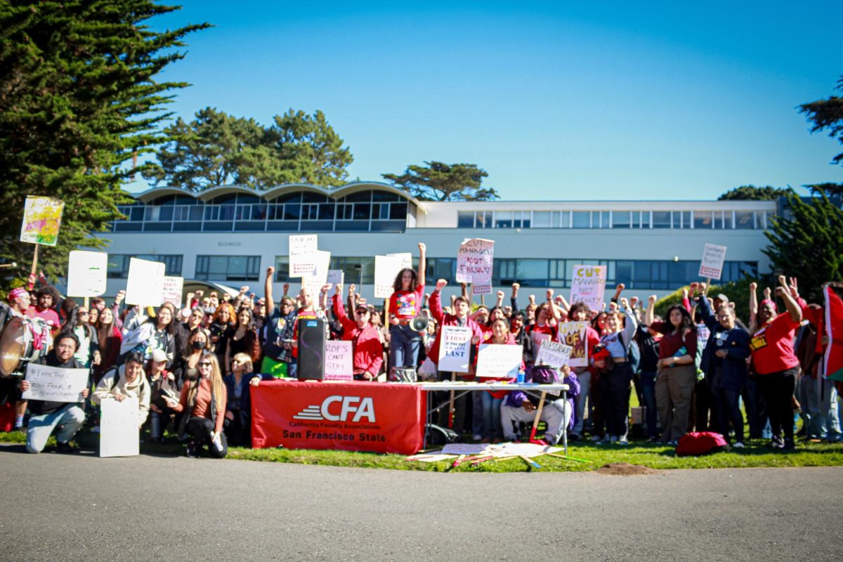 California Faculty Association members stand in solidarity during a walk-out at San Francisco State University on Oct. 26, 2023. (Kayla Williams / Golden Gate Xpress)