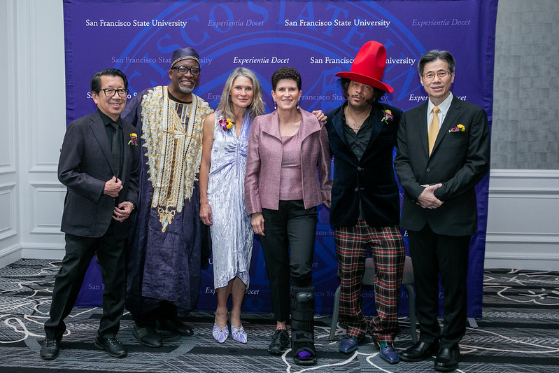 (Left to right) Ben Fong-Torres (Ceremony MC), Vincent Matthews, Gwynned Rose Vitello, Lynn Mahoney, Boots Riley, Pramukti Sujaudaja at the 2023 Alumni Hall of Fame at the Ritz Carlton on Nov. 3, 2023. (Courtesy of SFSU - Photos by Stuart Locklear)
