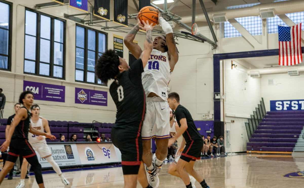 First-year+transfer+junior%2C+Tyjean+Burrell%2C+goes+for+a+tough+shot+during+the+men%E2%80%99s+basketball+game+against+Westmont+College+at+SFSU%E2%80%99s+main+gym+on+Nov.+18%2C+2023.+%28Ryosuke+Kojima%2FGolden+Gate+Xpress%29%0A