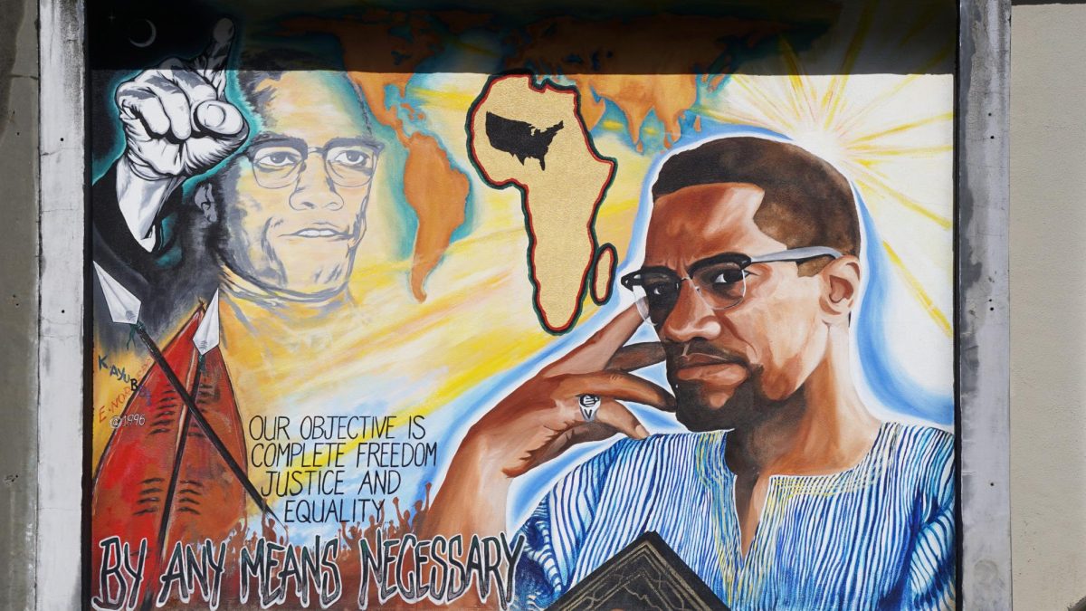The Malcolm X mural is seen at the Cesar Chavez Student Center on Feb. 19, 2024. The mural was created in 1996 by two former SFSU students, Eric Norberg and Kama Ayubbo. (Bryan Chavez / Golden Gate Xpress)