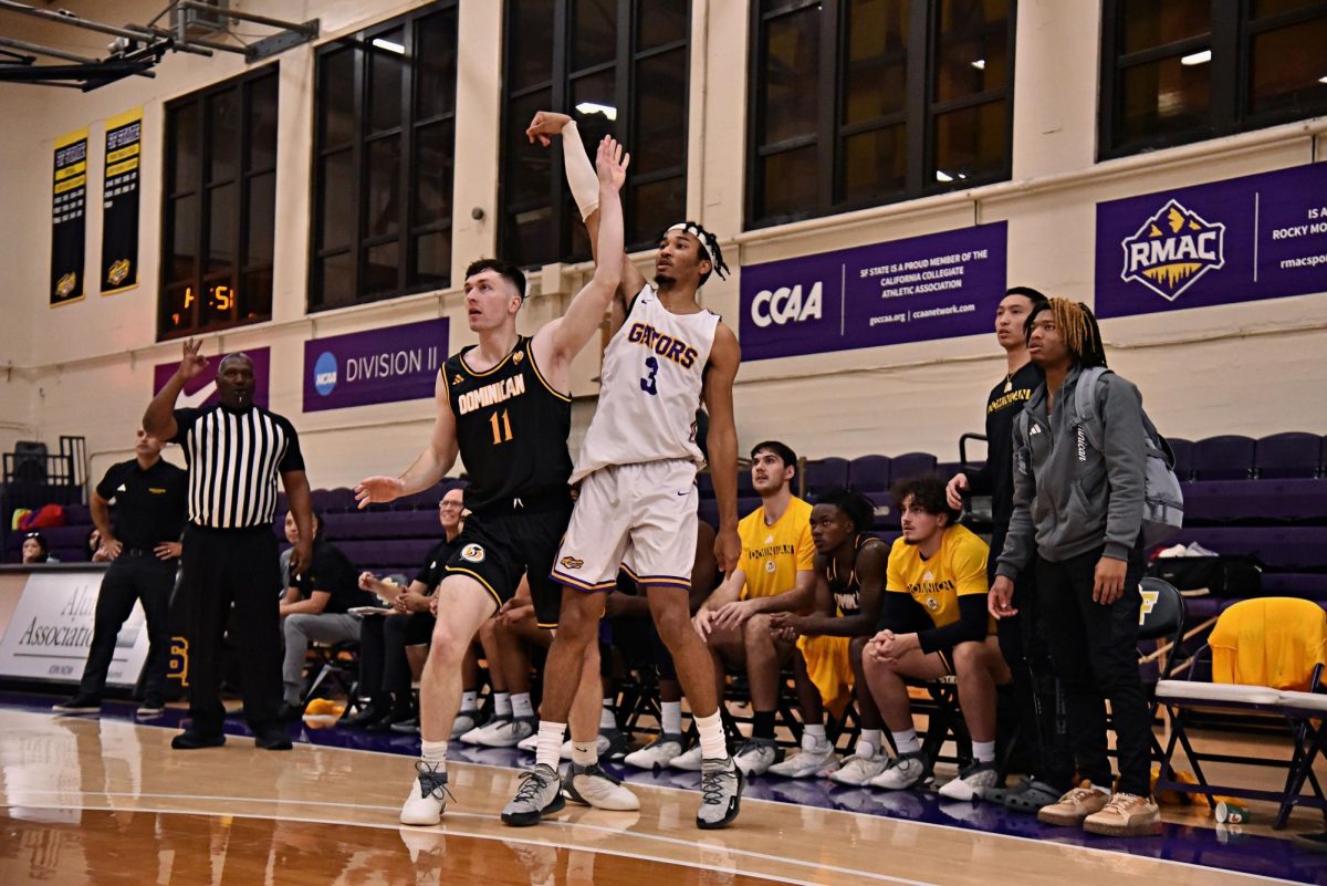 San Francisco State’s Caleb Oden watches a three-point shot attempt in a game versus Dominican University of California in SFSU’s Main Gym on Nov. 10, 2023.  (Vanden Harris special to Golden Gate Xpress)