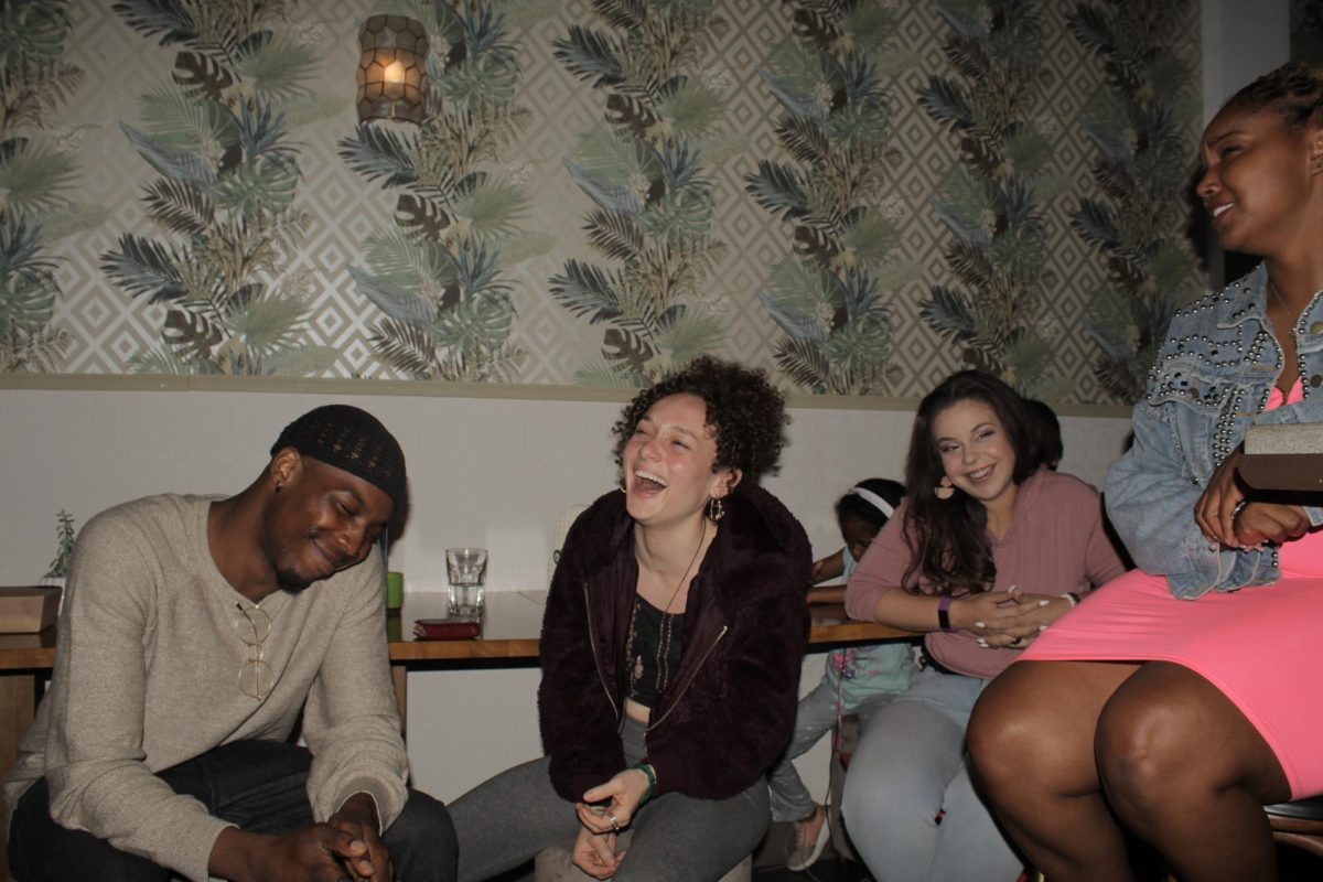 Zoe Nika Reidy-Watts shares a laugh with friends. (Courtesy of Khaia Ritter)