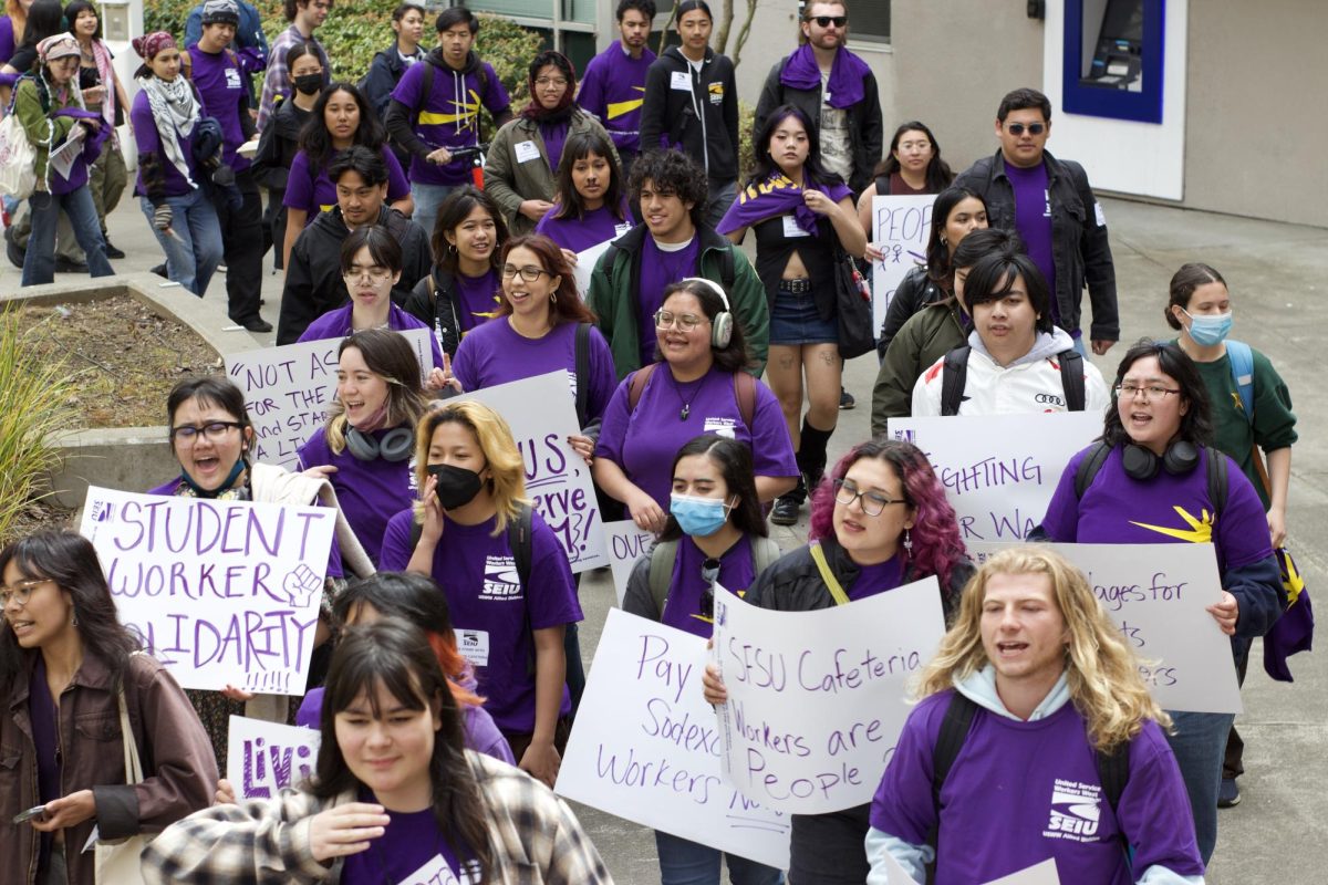 Rally attendees march to City Eats Dining Center during the SEIU-USWW rally on March 20, 2024. (Natalie Rocha / Golden Gate Xpress)