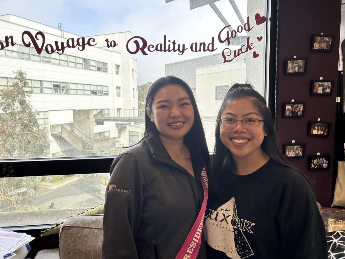 Claire Satuito (left) and MJ Parafina stand next to each other in the Women’s Center on the terrace level of Cesar Chavez Student Center on Satuito’s last day of being director, Feb. 29, 2024. (Natalie Metcalf / Golden Gate Xpress) 