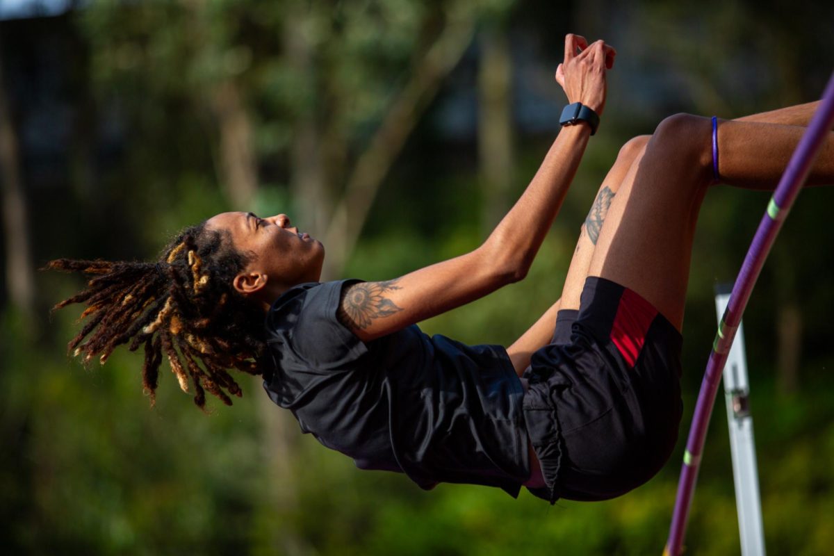 Macaria Moore-Bastide of the SFSU womens track & field team high jumps at Cox Stadium during practice on March 4. 2023. (Dan Hernandez / Golden Gate Xpress)