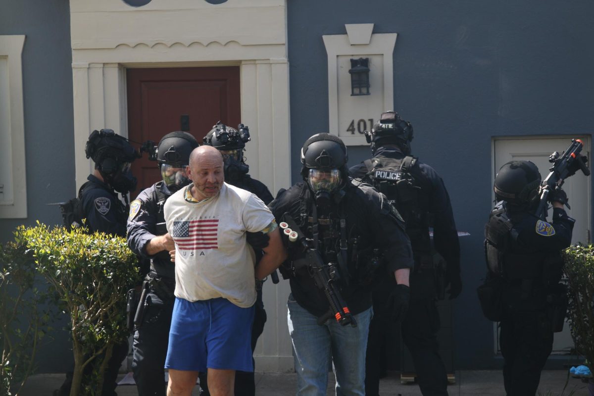 SFPD detain Erick Rosemon, ParkMerced resident, after his home was tear gassed at 403 Gonzalez Drive on April 8, 2024. (Adriana Hernandez/Golden Gate Xpress) 
