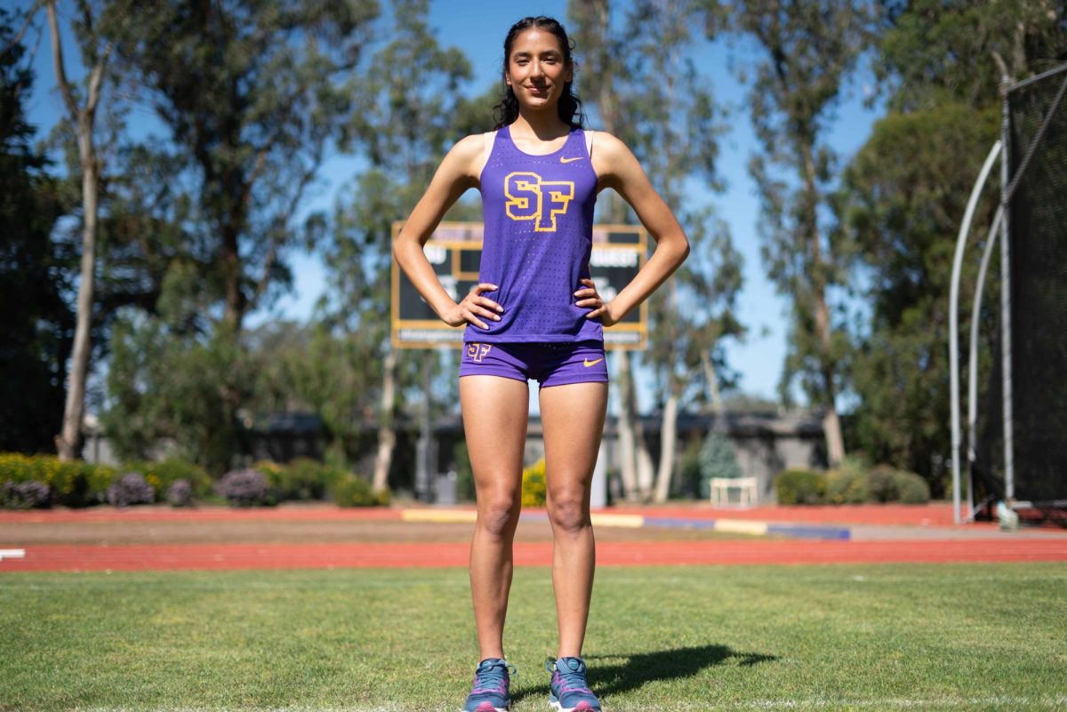 Yuridia Corona, a third-year San Francisco State University student athlete, poses at Cox Stadium on April 18, 2024. Corona, a distance runner, achieved a personal record of completing one mile in 4 minutes and 58 seconds on April 13.. (Gustavo Hernandez /Golden Gate Xpress)