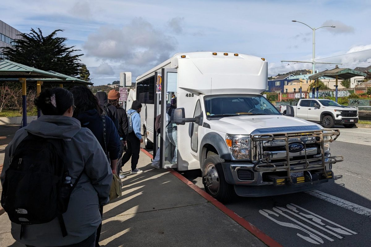 Passengers board one of SFSU's shuttles to Daly City BART station on March 4, 2024.