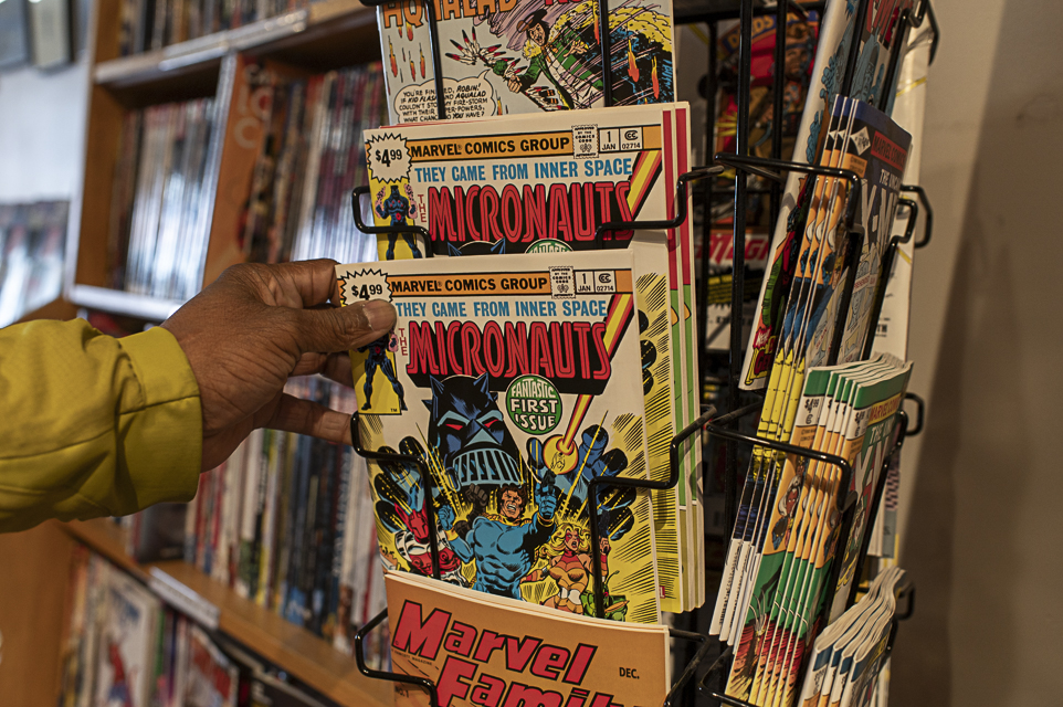 A customer grabs a “Micronauts” comic book at Comix Experience on May 3, 2024. (Matthew Ali / Golden Gate Xpress)