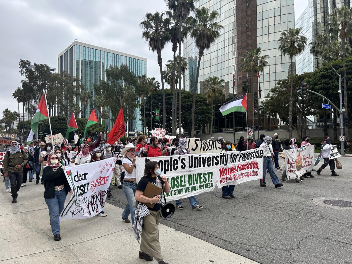 Students+for+Gaza+SFSU+and+other+student+organizations+from+other+CSU+campuses+walk+to+the+CSU+headquarters+building+where+the+Board+of+Trustees+meeting+is+held+on+May+21%2C+2024.+%28Cami+Dominguez%2F+Golden+Gate+Xpress%29