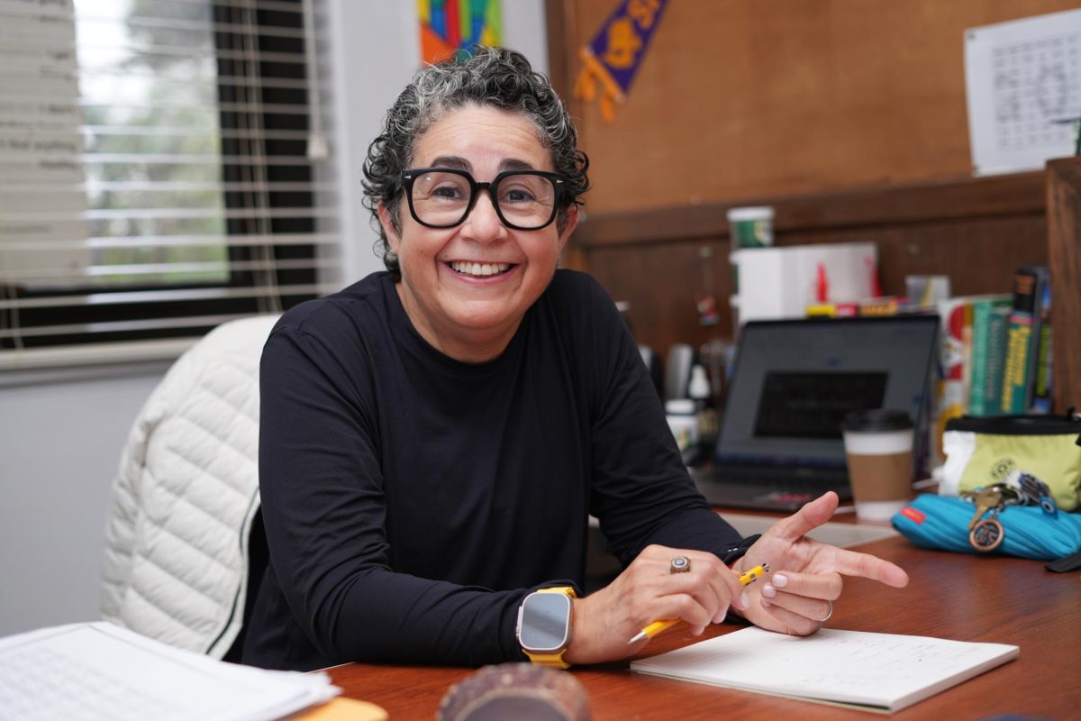 Claudia Guedes poses for a portrait in her office on Wednesday, Sept. 18, 2024. The low quality of physical education in Brazil was the driving force behind Guedes’ discovery of her passion for physical education. (Andrew Fogel / Golden Gate Xpress)