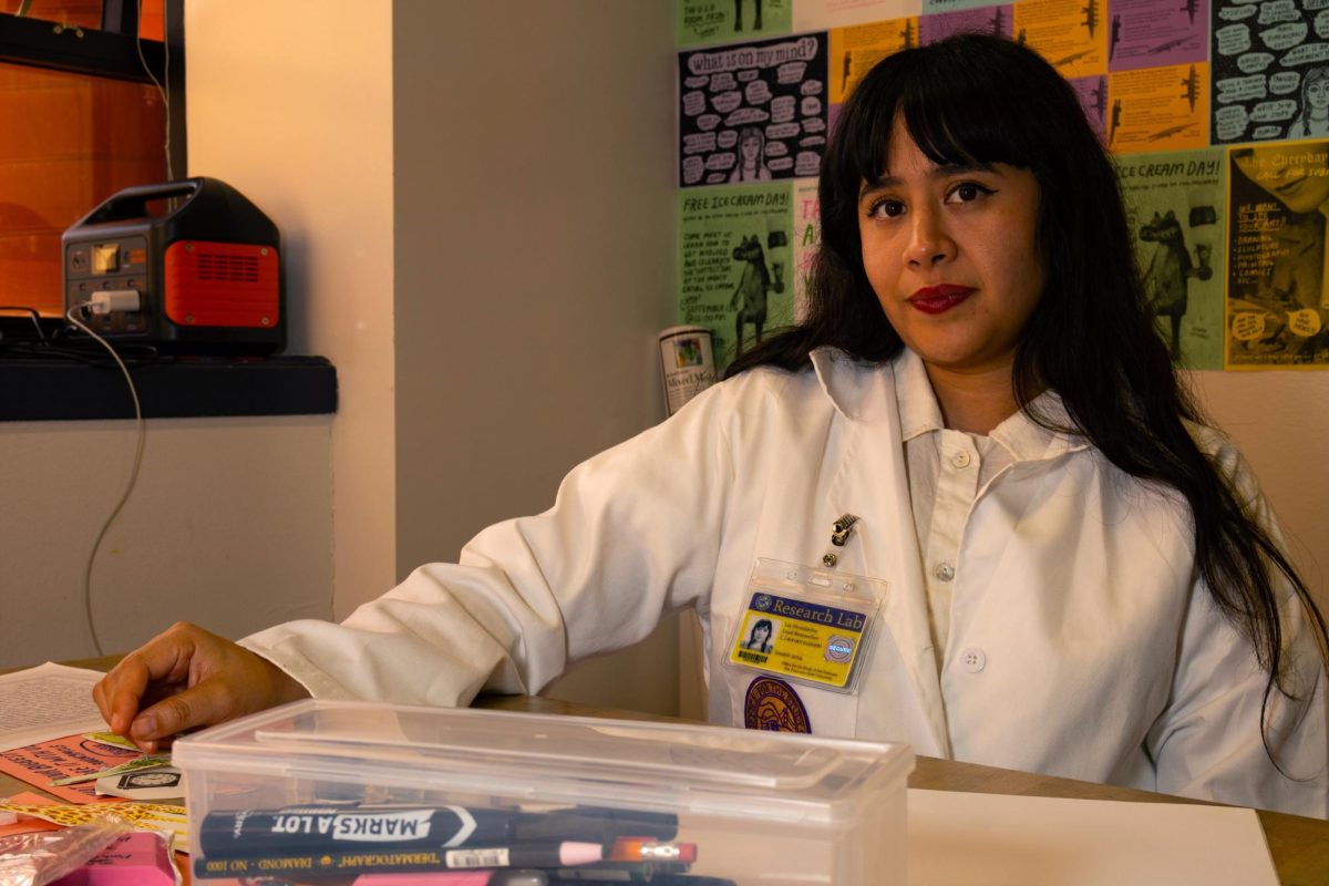 Liz Hernández poses for a portrait at the Office for the Study of the Ordinary on Monday, Sept. 30, 2024. (Jesus Arriaga / Golden Gate Xpress)