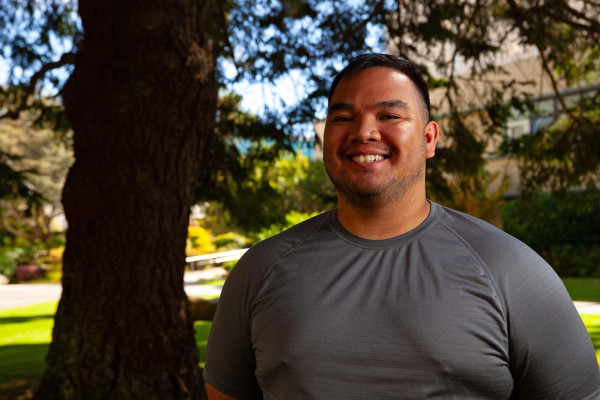 Veterans Education Transition and Support (V.E.T.S.) Corner president Christopher Lawrence Eustaquio poses for a portrait in the Garden of Remembrance on Oct. 11, 2024. “I express my patriotism by constructive criticism; by keeping the government accountable. Honoring traditions so we remember what certain events represent such as holidays or why we conduct ceremonies,” said Lawrence. (Jesus Arriaga / Golden Gate Xpress)