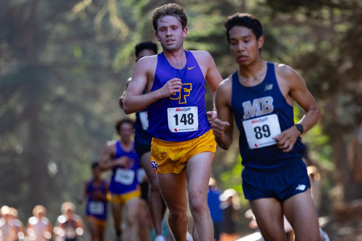 Brandon Johnson (148) of San Francisco State University competes at the San Francisco State Cross Country Invitational men’s 8K race at Golden Gate Park on Friday, Oct. 11, 2024. SF State competed against 12 groups, with CSU Stanislaus taking 1st place both in men’s 8K and women’s 6K. (Jesus Arriaga / Golden Gate Xpress)