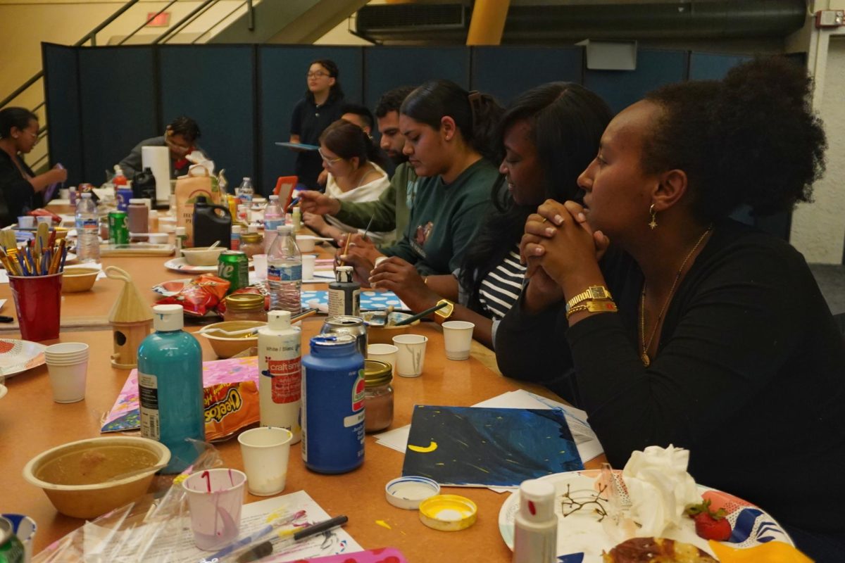 Attendees of B.R.U.H.’s “Time to Self-Care” event painted in Rigoberta Menchu Hall on Thursday, Oct. 10, 2024. (Neal Wong / Golden Gate Xpress)