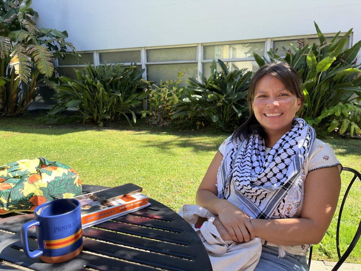 Emilia León, profesora de SFSU, posea por un foto el 30 de septiembre. (Sophia Rerucha / Golden Gate Xpress)