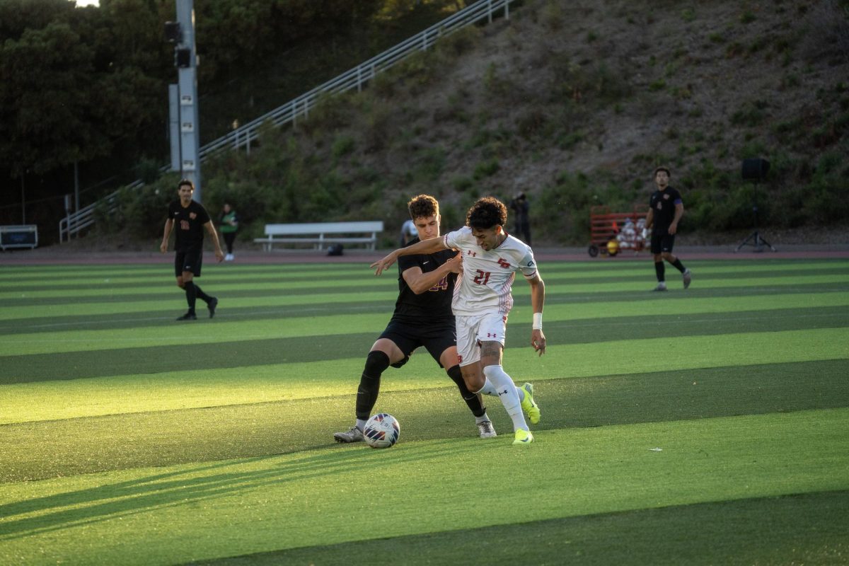 SF State Men’s Soccer defender Angel Sevillano (24) prevents California State University, East Bay defender Kendrick Rivas (21) from advancing the ball upfield at Pioneer Stadium in Hayward, Calif. on Thursday, Oct. 17, 2024. (Sean Young / Golden Gate Xpress)