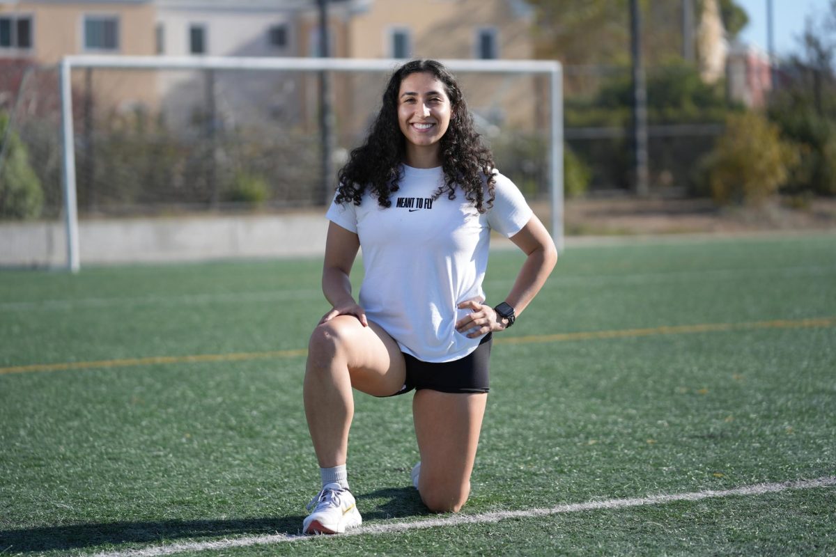 Jacqueline Macedo, a junior kinesiology student and vice president of the Women’s Soccer Club, poses for a portrait on the multipurpose field on Thursday, Oct. 3, 2024. Macedo, a transfer student from San Joaquin Delta College, has played soccer her whole life and looks forward to growing the club’s presence on campus. (Andrew Fogel / Golden Gate Xpress)
