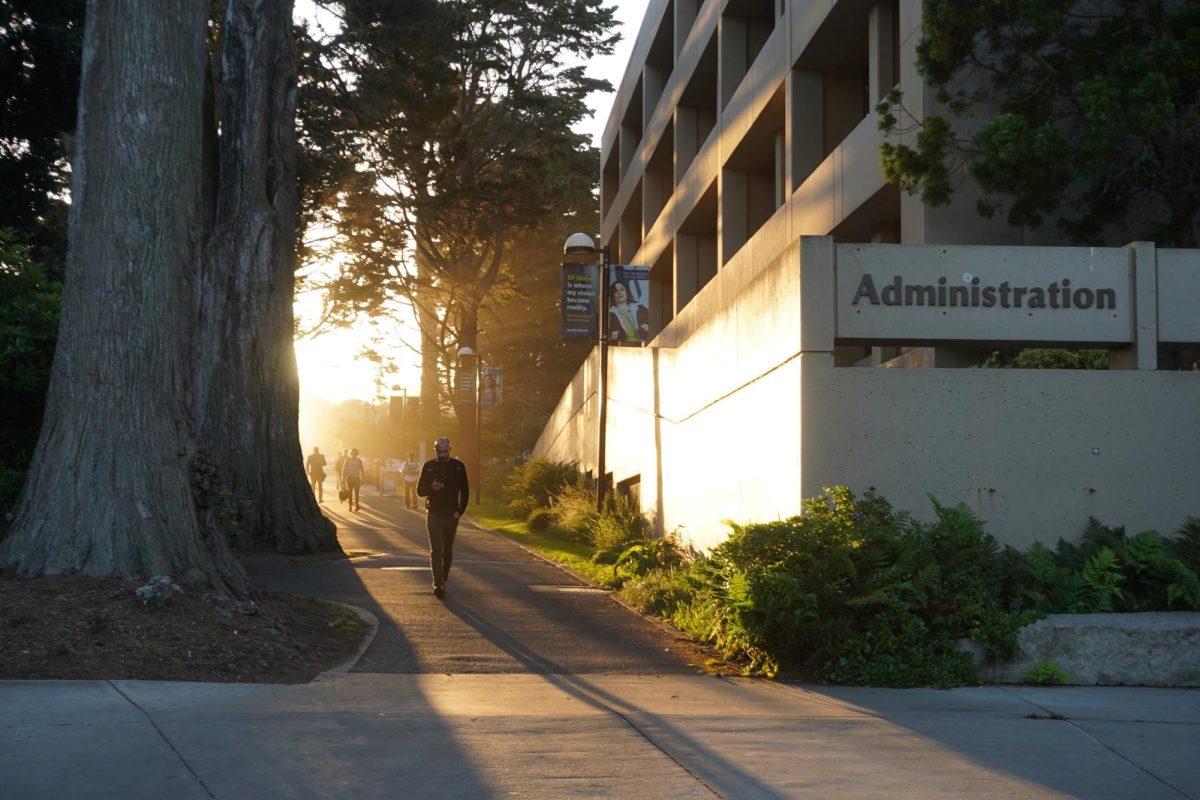 People walk on campus near the Administration Building on Oct. 8, 2024. (Neal Wong / Golden Gate Xpress)