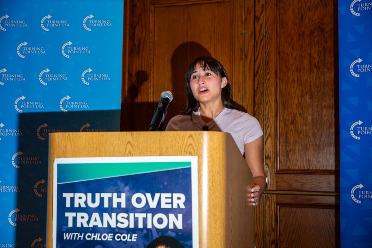 Chloe Cole, the featured guest speaker of the event “Truth or Transition,” hosted by the Turning Point USA chapter at SFSU, speaks about her experience detransitioning in the Seven Hills Conference Center at SFSU on Tuesday, Nov. 12, 2024. (Dan Hernandez  / Golden Gate Xpress)