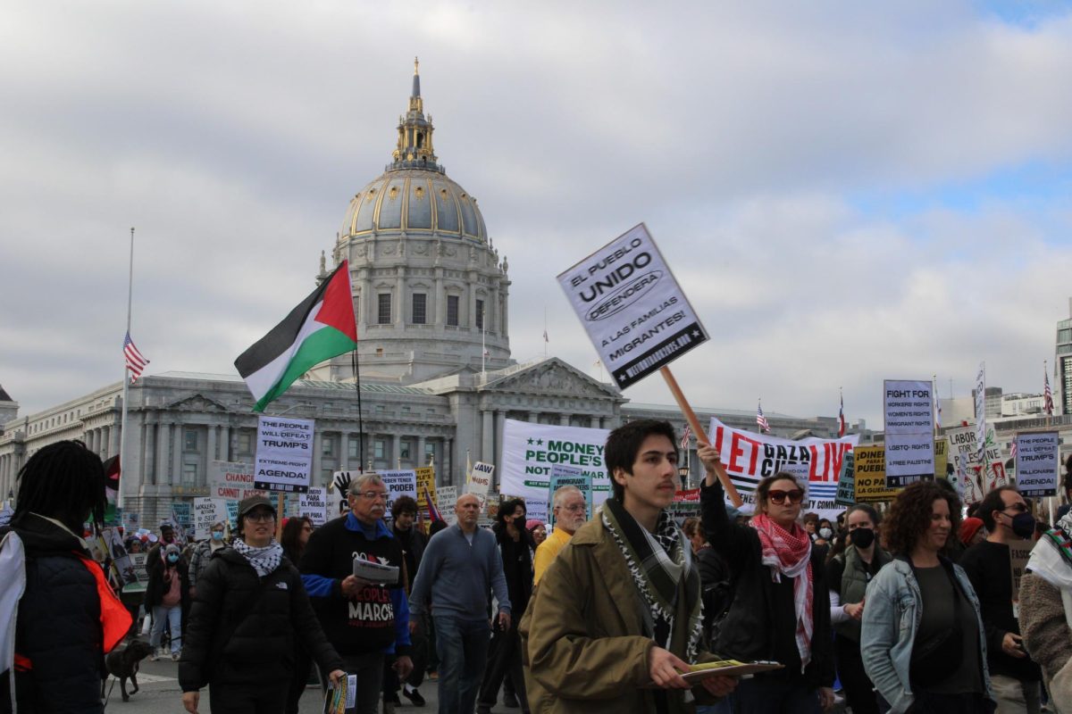 More than a thousand march through the Civic Center in San Francisco to protest the inauguration of President-Elect Donald Trump on Sunday, Jan. 19, 2025. (Olivia Moran / Golden Gate Xpress)