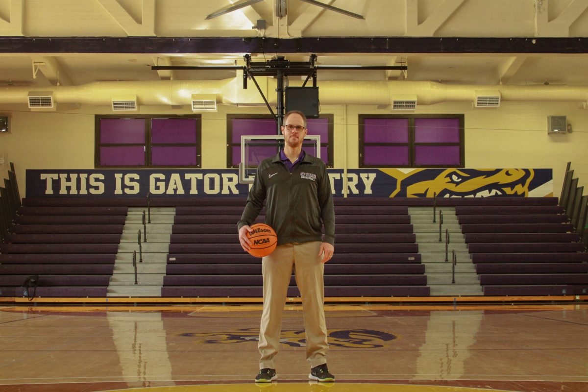 SFSU men’s basketball head coach Vince Inglima poses for a portrait at the Swamp on Friday, Feb. 14, 2025. (Paula Sibulo / Golden Gate Xpress)