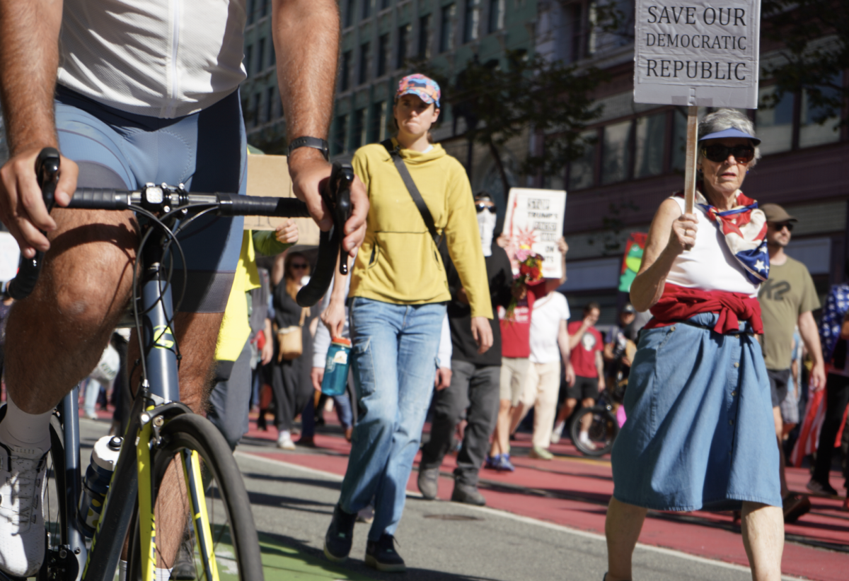 San Francisco “No Kings” protesters march down Market Street towards the Civic Center Plaza on Saturday, Oct. 18, 2025. (Lindsey Hoang / Golden Gate Xpress)