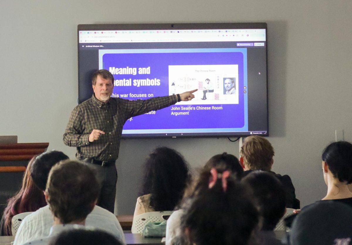 Sonoma State University professor John Sullins presents “Artificial Wisdom: What Role Does Philosophical Wisdom Play in a World of AI?” in Humanities 587 on Thursday, Feb. 26, 2026. (Eliza Arthur / Golden Gate Xpress)