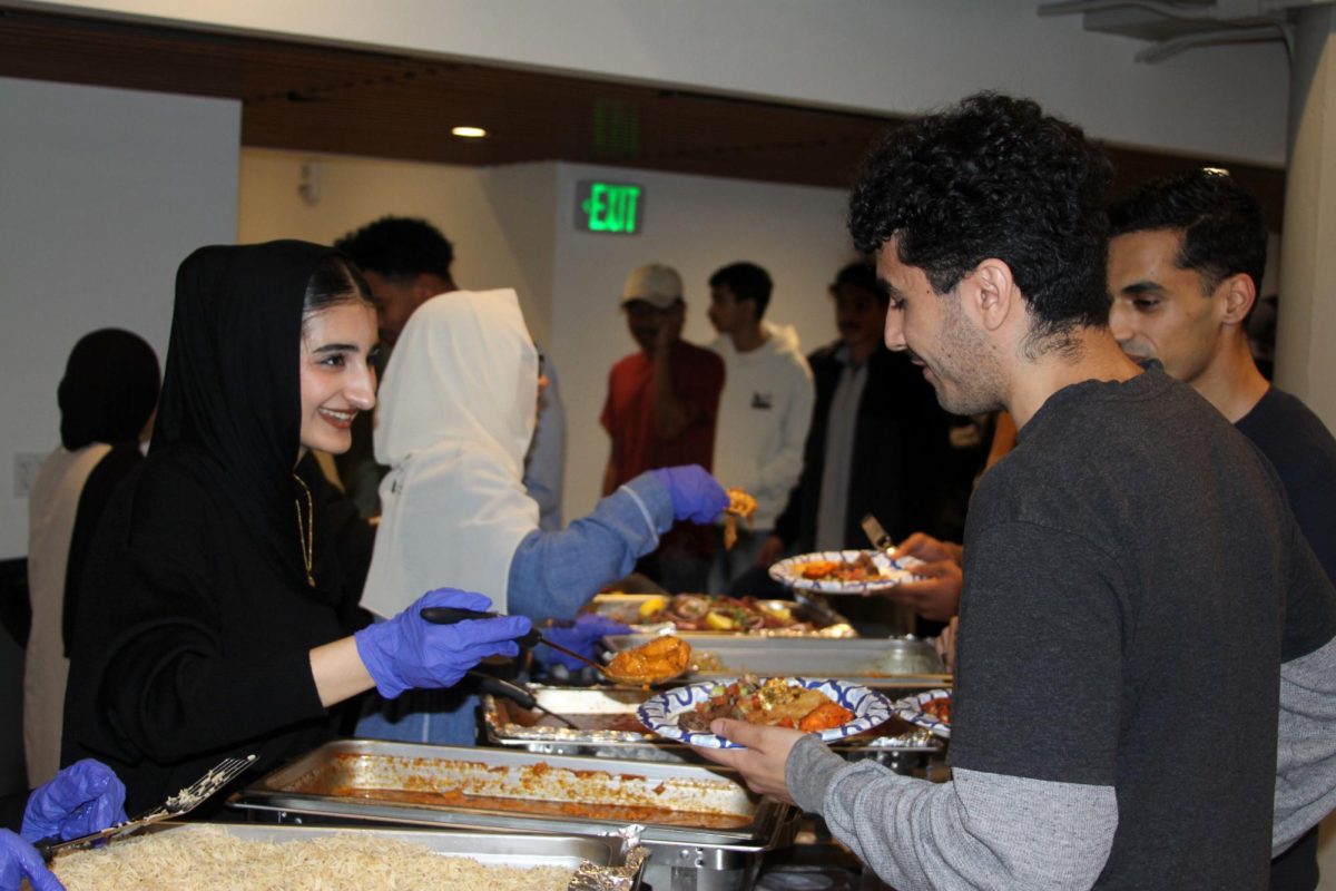 The Muslim Student Association serves Afghan cuisine as an iftar meal for students to break their fast at MSA's first iftar event at the University Club in the Cesar Chavez Student Center on Tuesday, Feb. 24, 2026. (Amin Faramarz / Golden Gate Xpress)