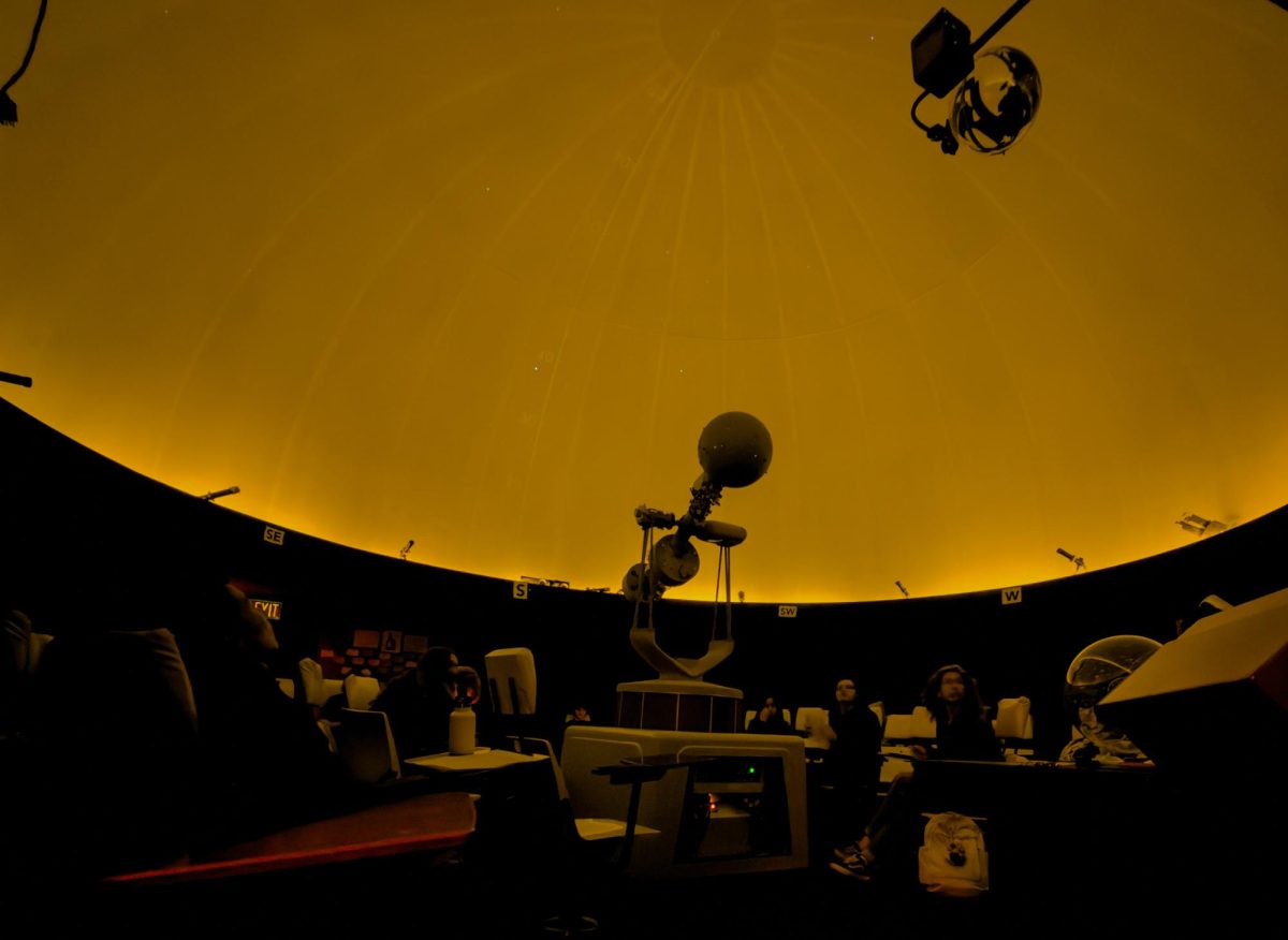 Students wait for class to start in the Charles F. Hagar Planetarium on Wednesday, Feb. 18, 2026. (Lindsey Hoang / Golden Gate Xpress)