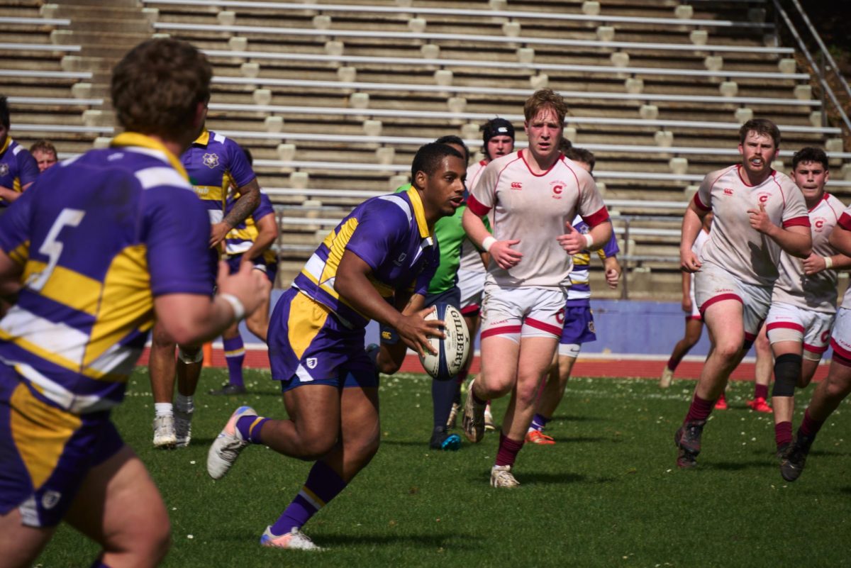 Senior Alec Shelton runs the ball to the try zone against the California State University, Chico Wildcats at Cox Stadium on Saturday, Feb. 28, 2026. (Lindsey Hoang / Golden Gate Xpress)