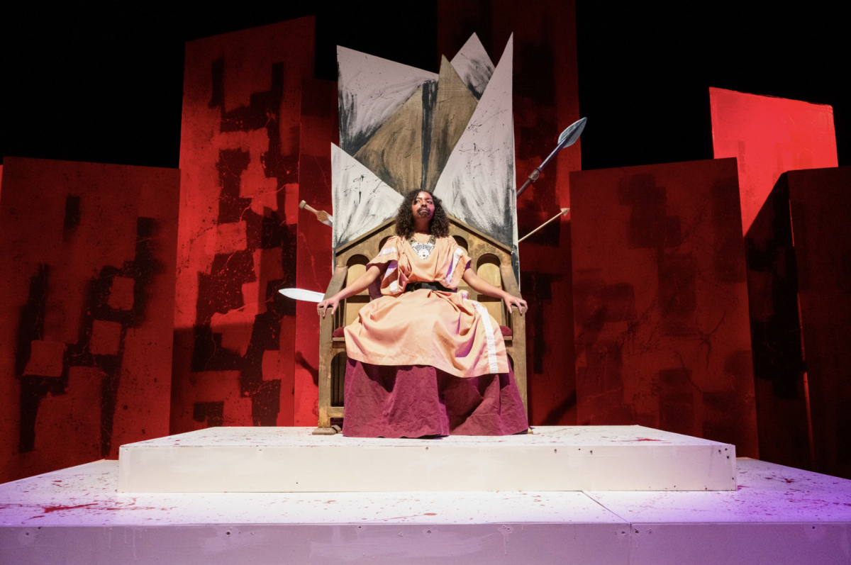 Creon (Axel Tomelloso) sits on his throne onstage during Sophocles’ “Antigone” on Monday, April 27, 2026. (Lindsey Hoang / Golden Gate Xpress) 